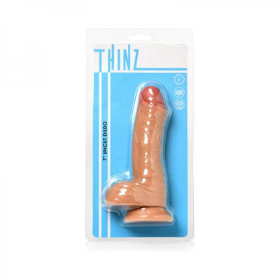 Curve Thinz 6.4 inch light uncut dildo with balls